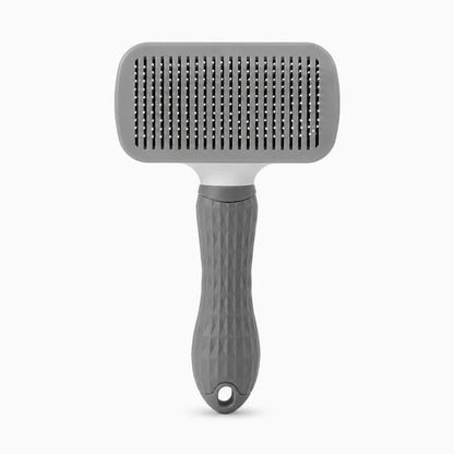 Brosse poil de chien grise avec poignée ergonomique pour démêler et nettoyer le pelage