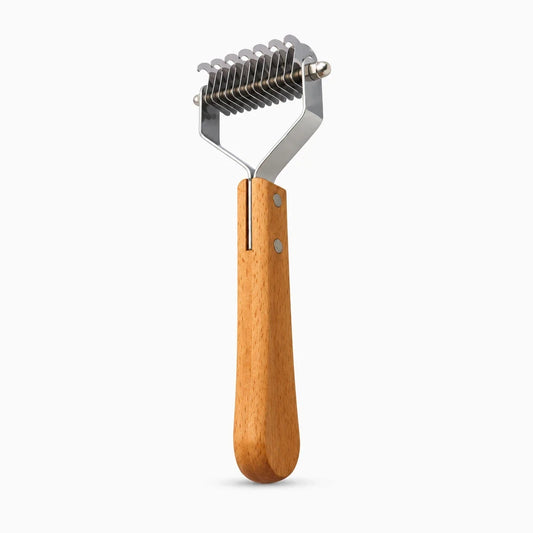 Brosse démêlante à dents fines pour chien à poil long, vue de face