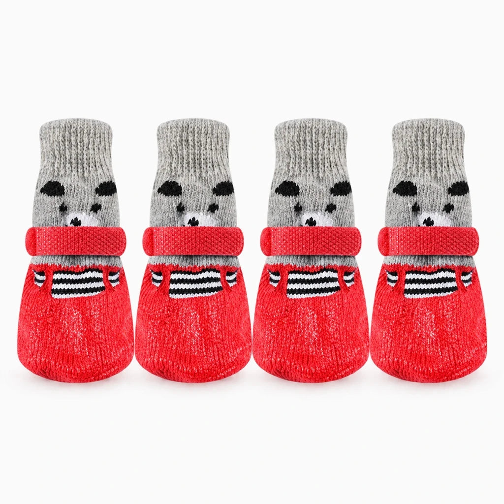 Botte d'hiver pour chien en rouge, isolation thermique des coussinets sur surface humide