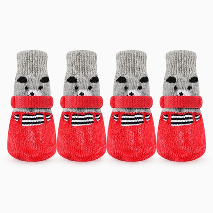 Botte d'hiver pour chien en rouge, isolation thermique des coussinets sur surface humide