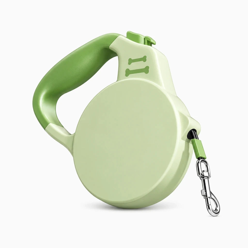 Détail du mécanisme de blocage et poignée ergonomique de la laisse rétractable, coloris vert