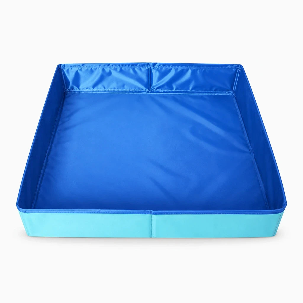 Piscine pour chat pliable bleu avec bords surélevés, idéale pour rafraîchir animaux de compagnie en été
